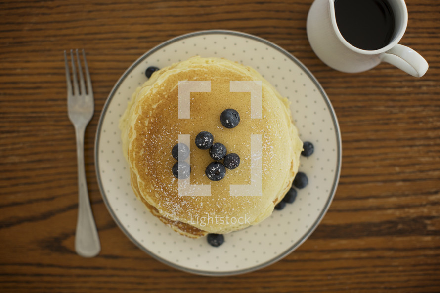stack of pancakes with blueberries 