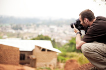 Photographer taking photo outdoors