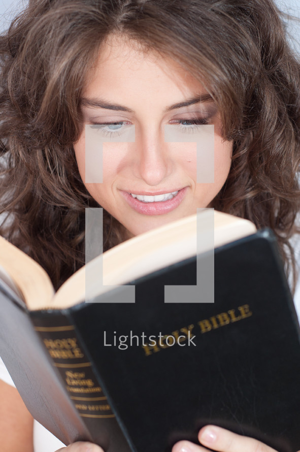 woman reading a Bible