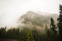 rising fog over a mountain 