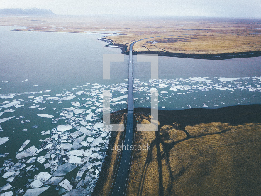bridge over an icy lake 