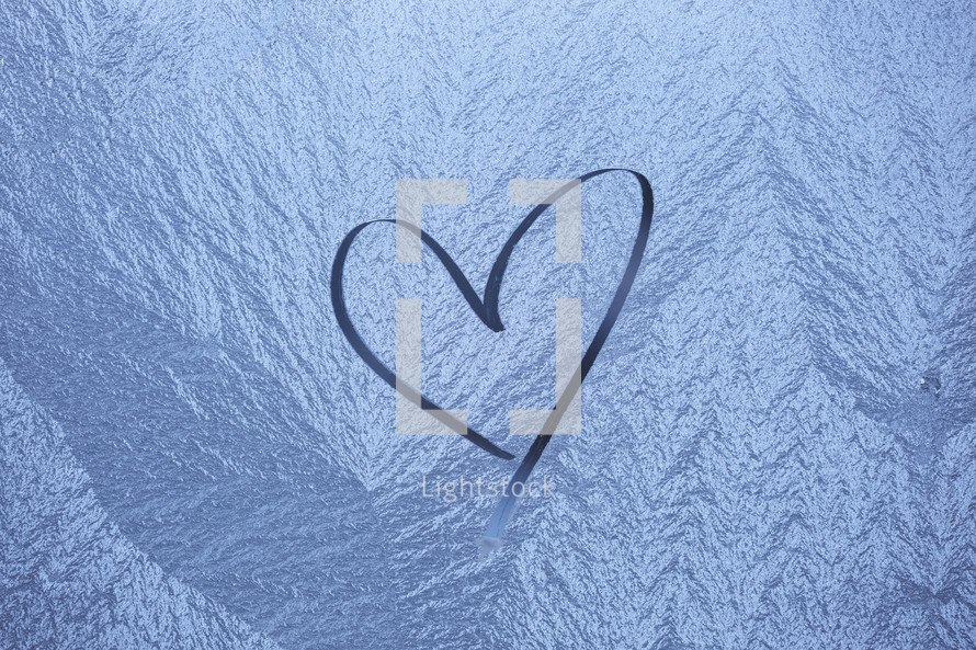 heart shape drawn in ice.