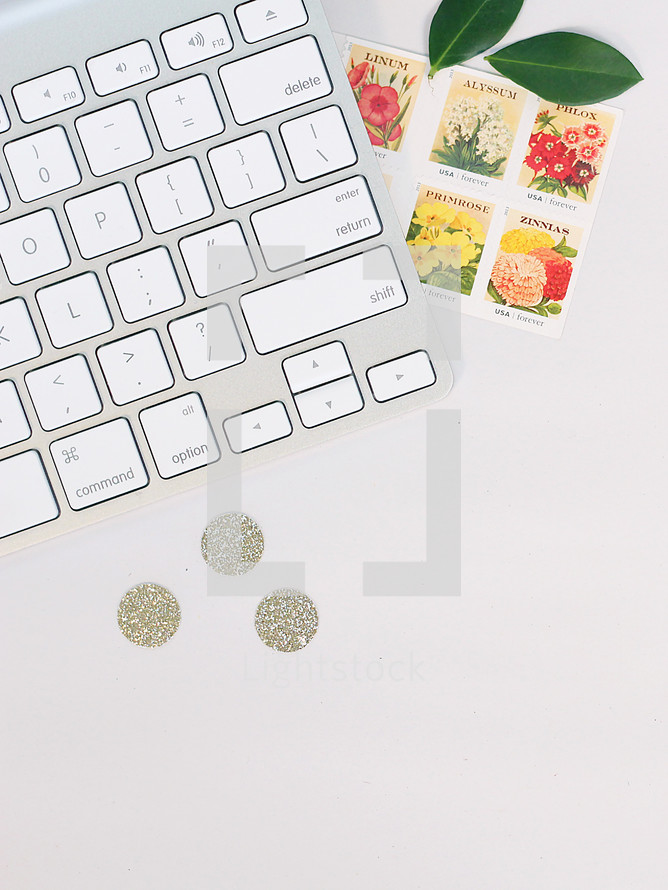 keyboard, stamps, leaves, sparkle dots, workspace, desk, home office 