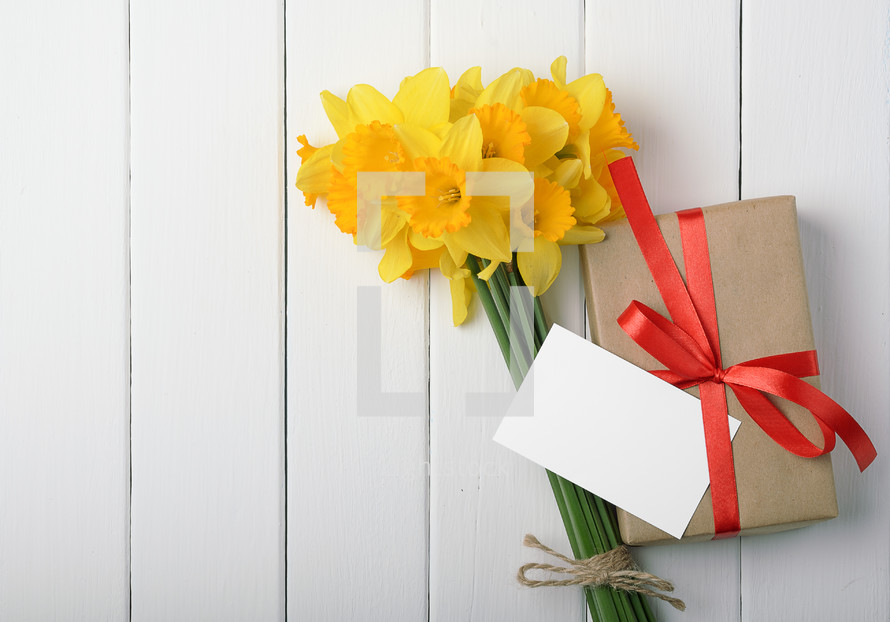 simple gift and a bouquet of daffodils 