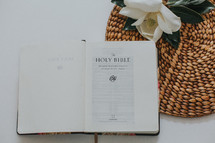 magnolia flower and open Bible 