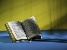 open Bible against blue 