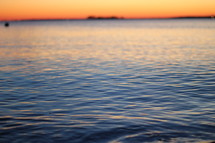 sea water surface at sunset 