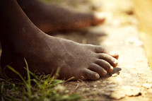 bare feet in dirt