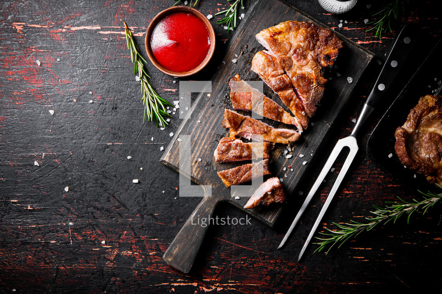 Grilled pork steak with rosemary. High quality photo