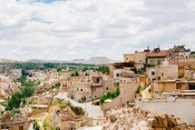 view over homes on the hillsides in Cappadocia