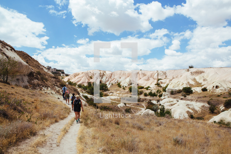 people hiking on trails in Cappadocia 