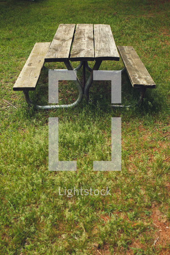 picnic table in grass
