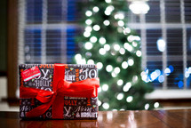 bokeh Christmas tree and wrapped gift 