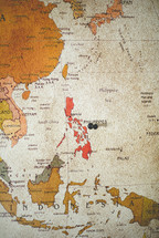 pin in a map near the Philippines 