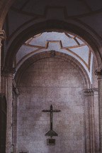 plaque under a cross