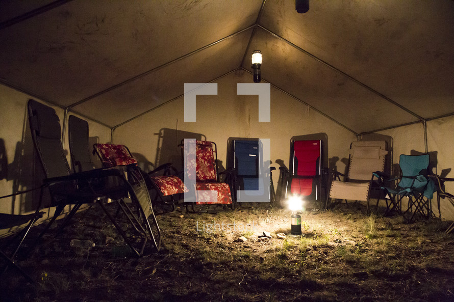 a glowing lantern in a tent 