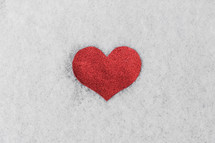 red heart in snow 