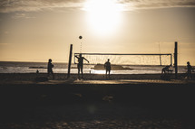 beach volley ball at sunset 