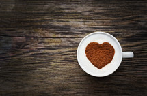 heart shape out of cinnamon in a mug 