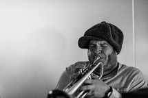 man playing a trumpet 