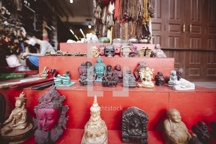 figurines and beads in a market 