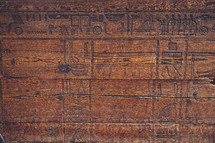 carved wood hieroglyphics in Egypt 