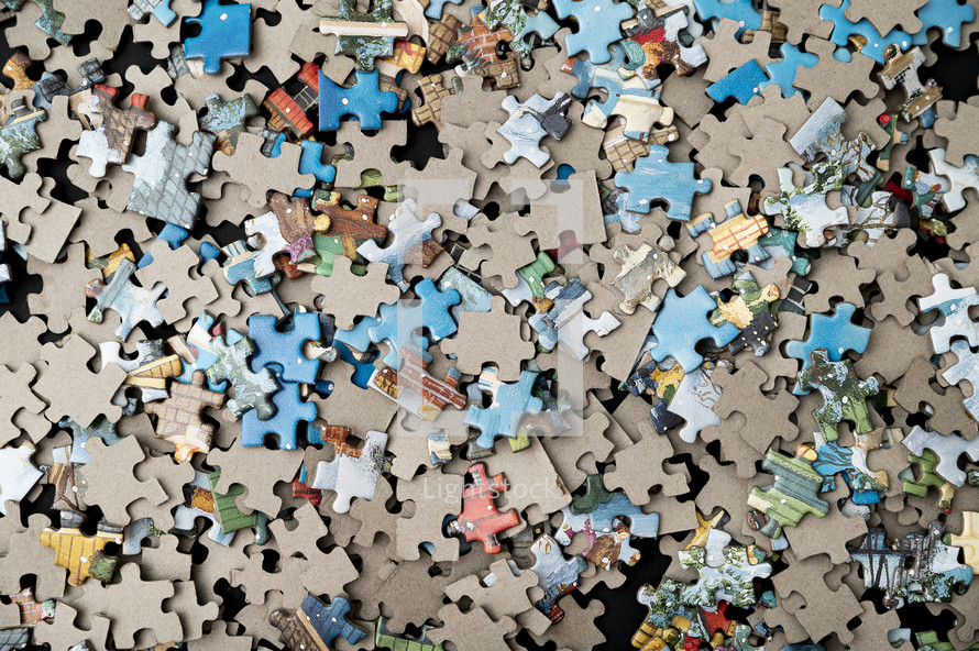 puzzle pieces in a pile 