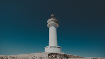 a small white lighthouse 