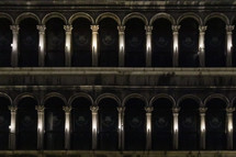 lights shining on columns in Venice 