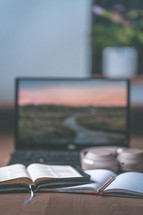 listening to an online worship service on a computer 