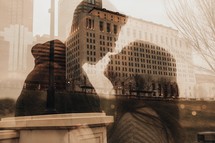 double exposure of a couple in a city 