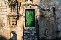 green doors on a church in Jerusalem 