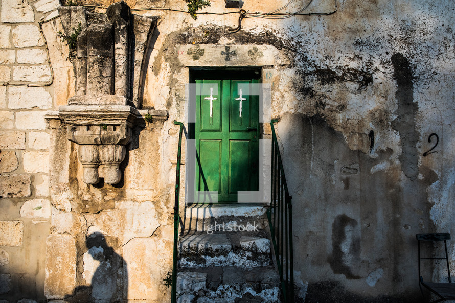green doors on a church in Jerusalem 
