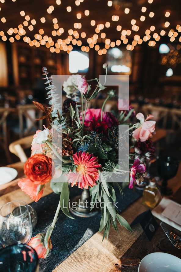 flower arrangement on a table at a wedding 