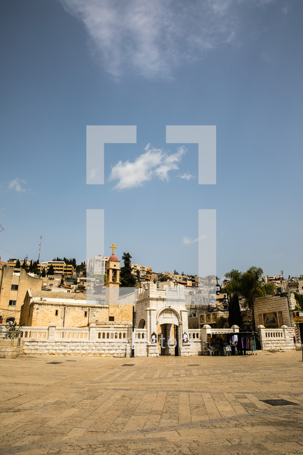courtyard in front of an ancient church in the holy land 