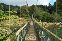 A suspension bridge over a river