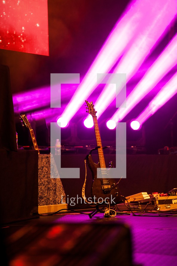 stage lights and an electric guitar
