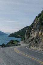 curvy road along a coastline 