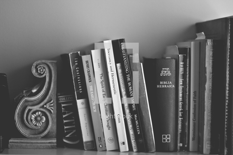 books on a bookshelf at Bible study 