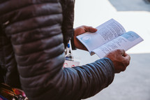 man holding a Bible in Myanmar