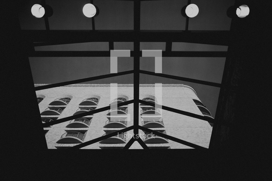 A view of a building through a skylight