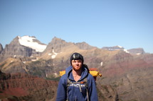 a man hiking a rugged landscape 