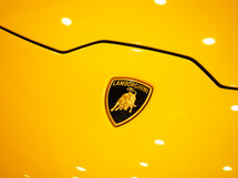 Yellow Lamborghini Aventador S in showroom