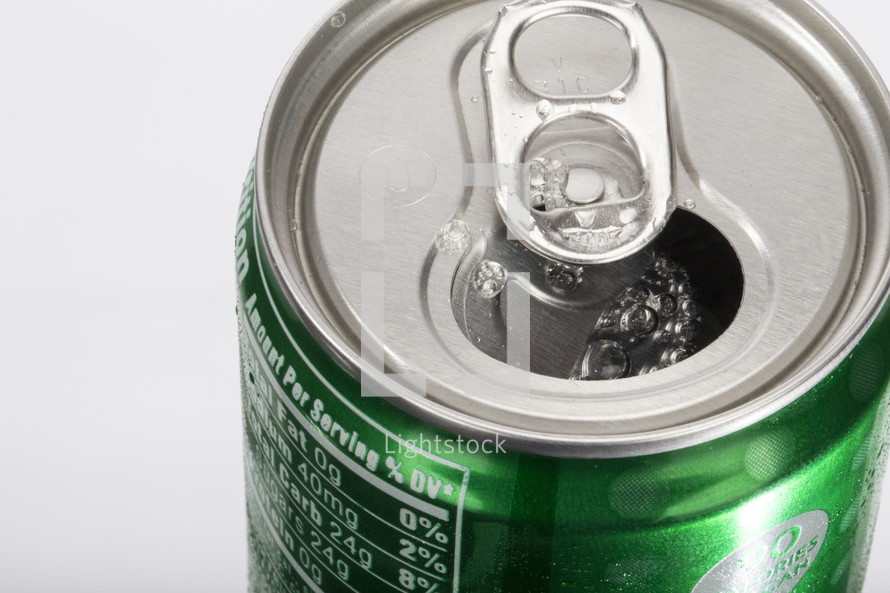 An open green soda can.