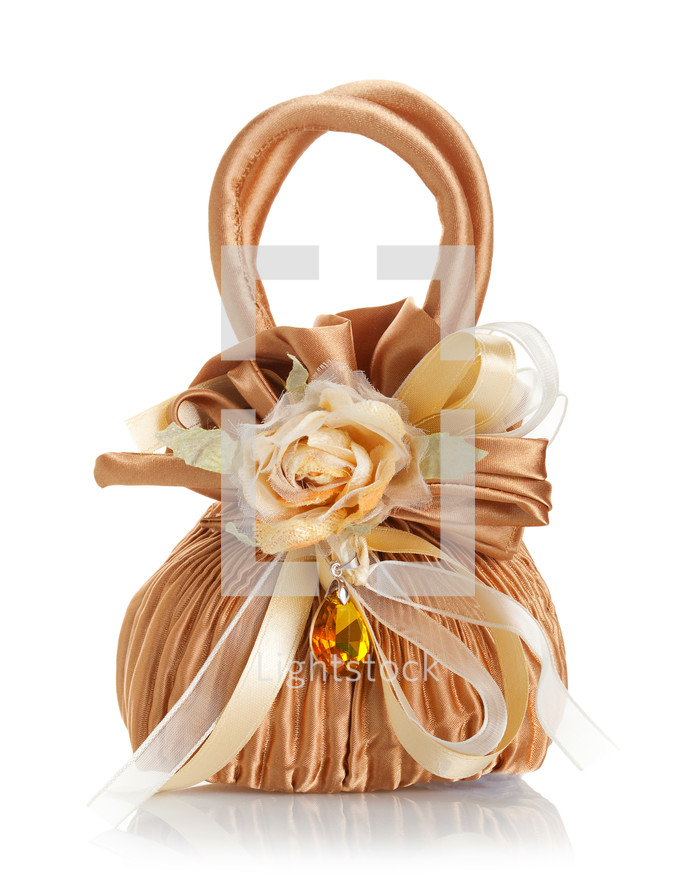 Wedding Favor shaped bag with amber on white background.