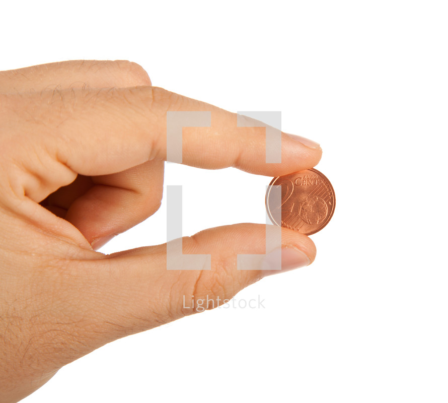 money - 2 euro cent between the fingers on white background