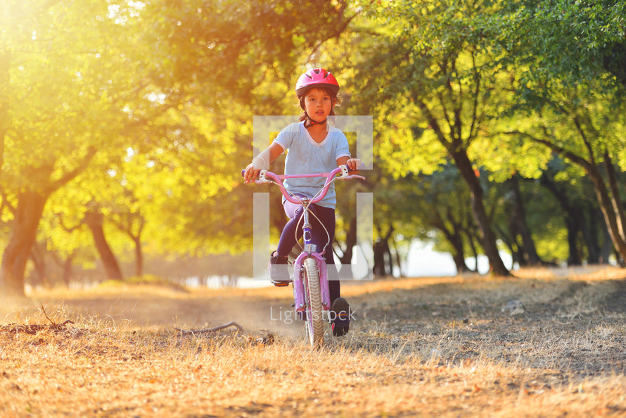 Happy child on a bike 