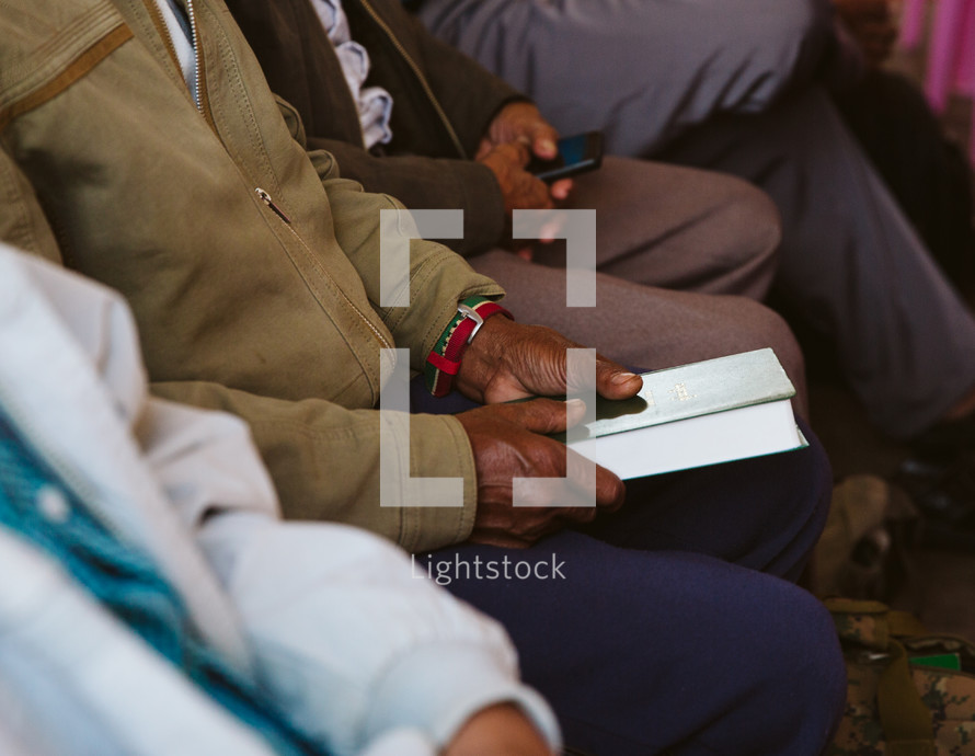 man holding a Bible in Myanmar