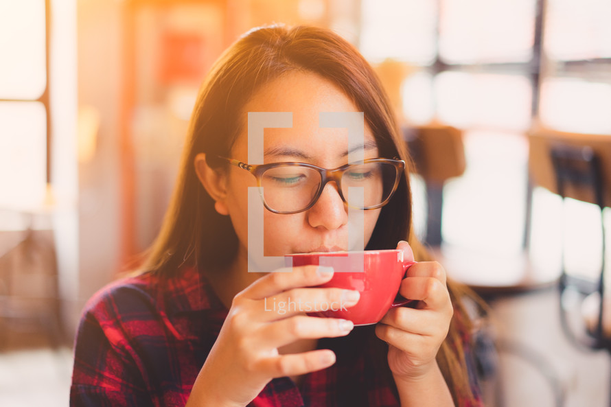 a woman drinking tea 