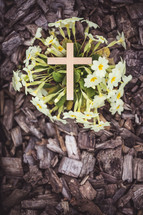 wood cross in flowers 
